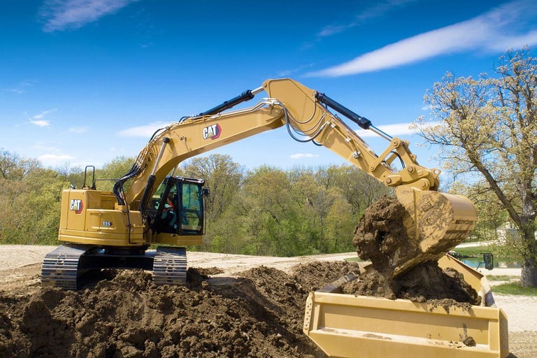 Excavator Loading a Truck